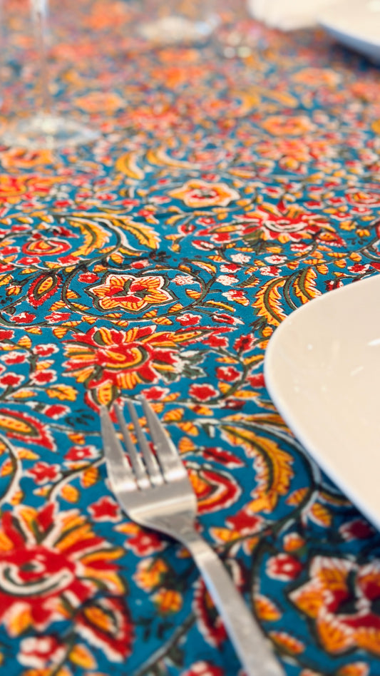 Hand-printed teal blue block print cotton tablecloth 150x220cm (60x87 inches): vibrant floral pattern with multi-layered decorative border and striped trim.