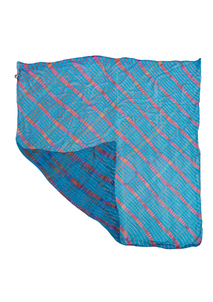 Square scarf in silk chiffon with manual dyeing in light blue