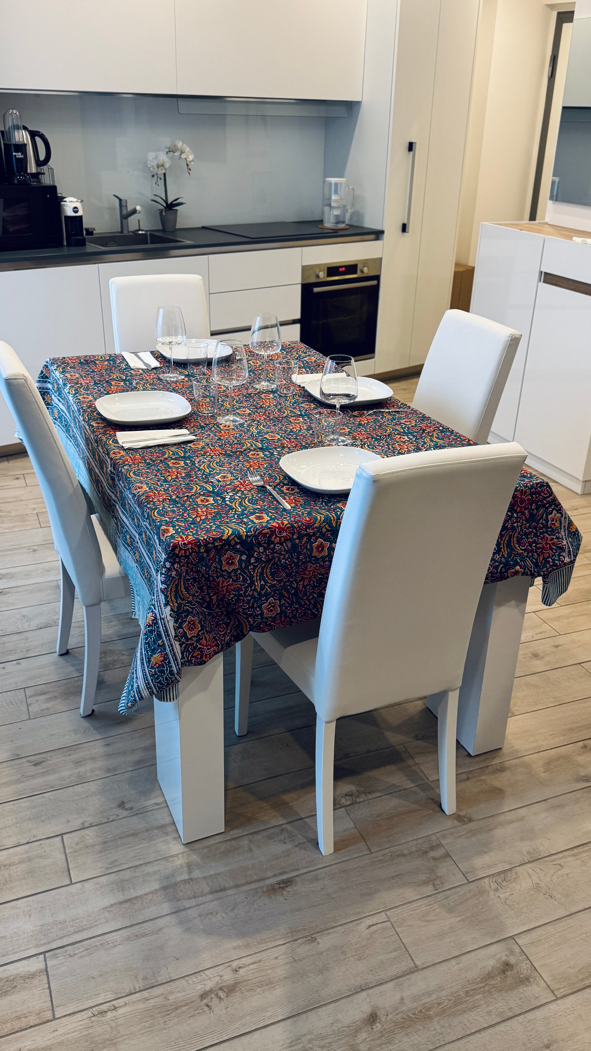 Hand-printed teal blue block print cotton tablecloth 150x220cm (60x87 inches): vibrant floral pattern with multi-layered decorative border and striped trim.