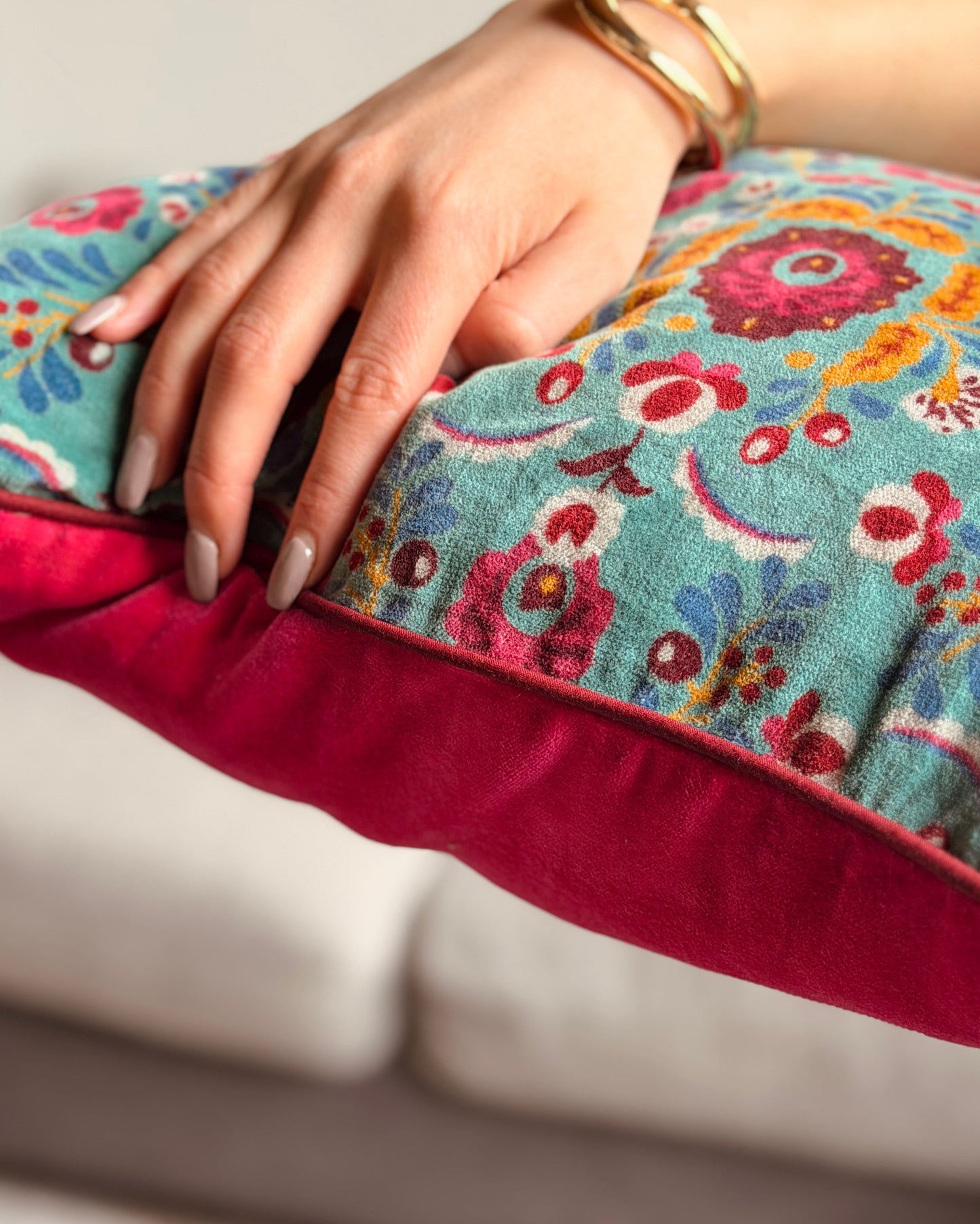 Set of 2 reversible velvet cushion covers 40x40cm (16x16 inches): teal floral screen print front and solid fuchsia pink back with burgundy piping.