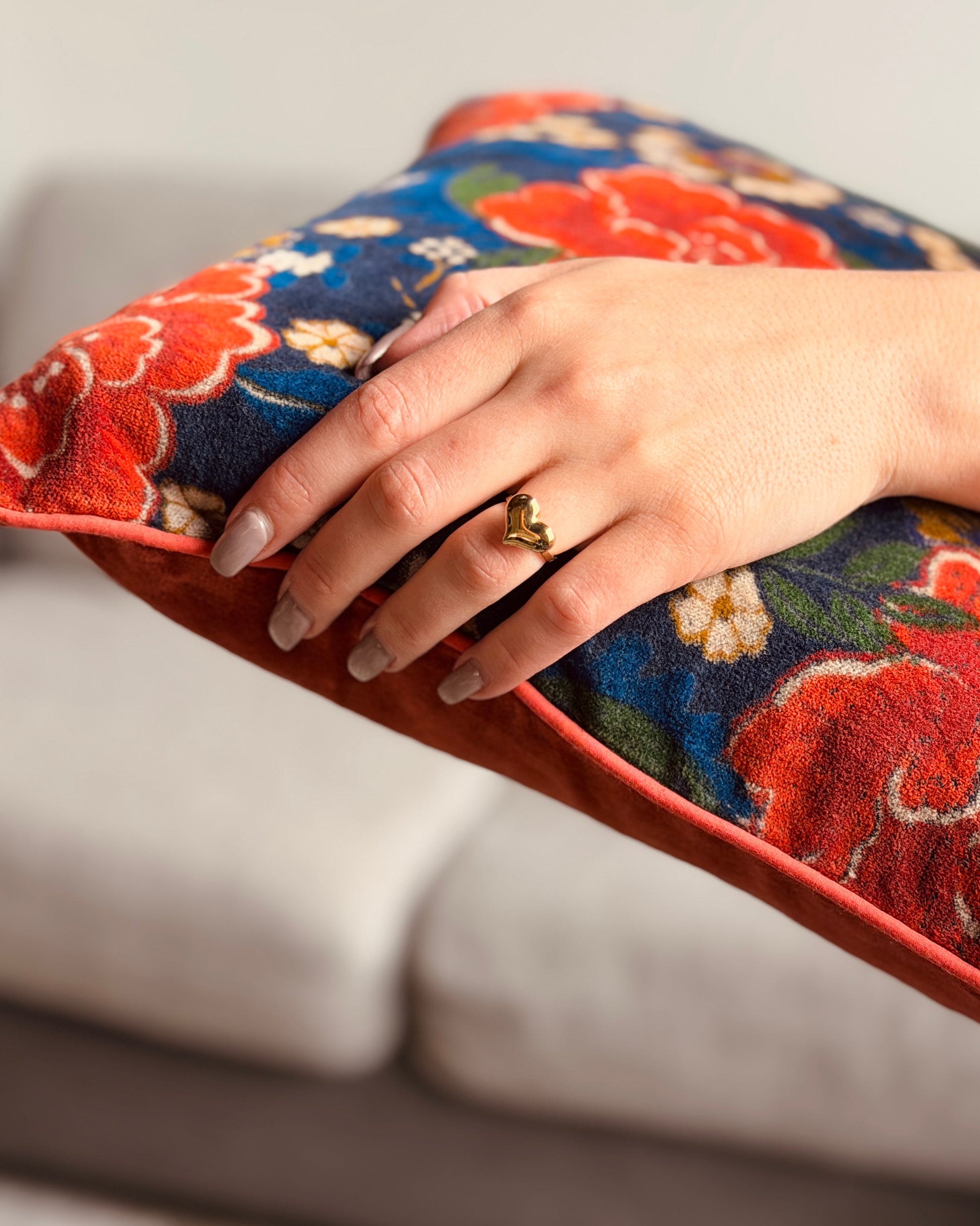 Set of 2 reversible velvet cushion covers 40x40cm (16x16 inches): dark navy blue with red floral screen print and solid orange rust back with contrasting rust piping.