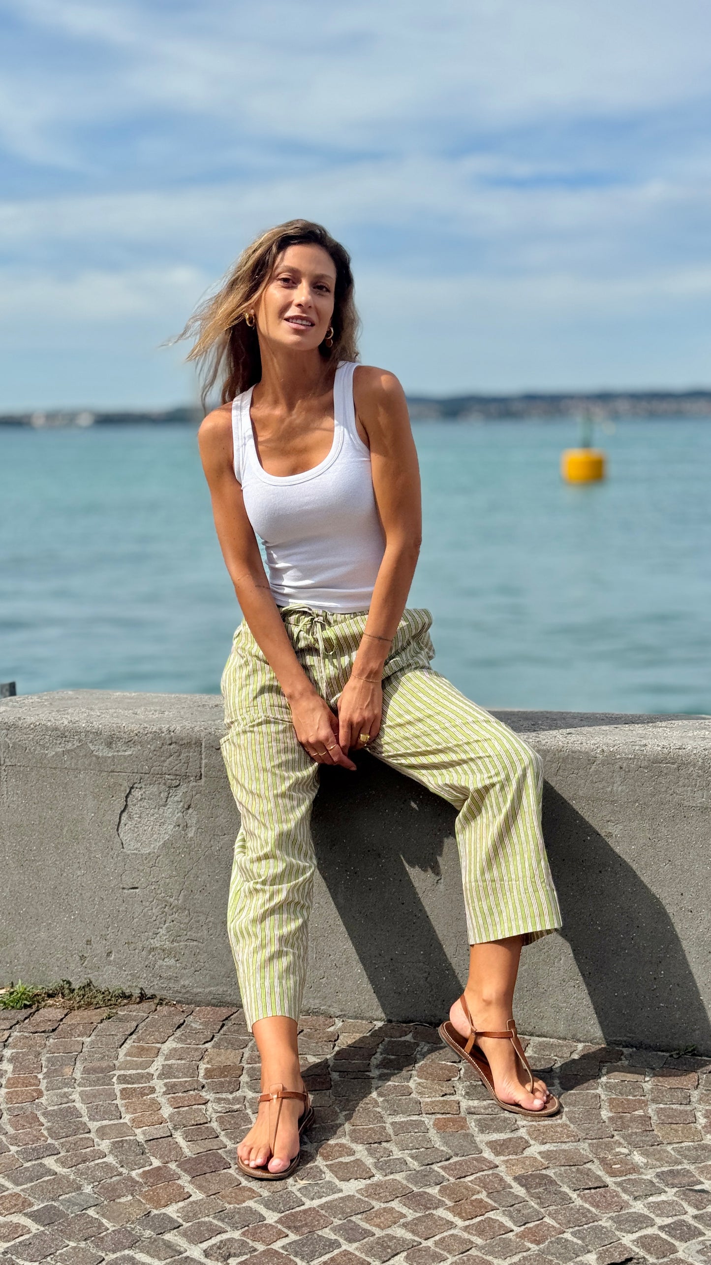 Green and white striped block print Indian cotton cigarette trousers, elegant and versatile