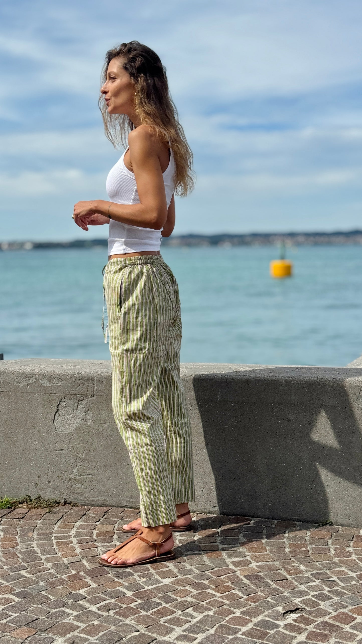 Green and white striped block print Indian cotton cigarette trousers, elegant and versatile