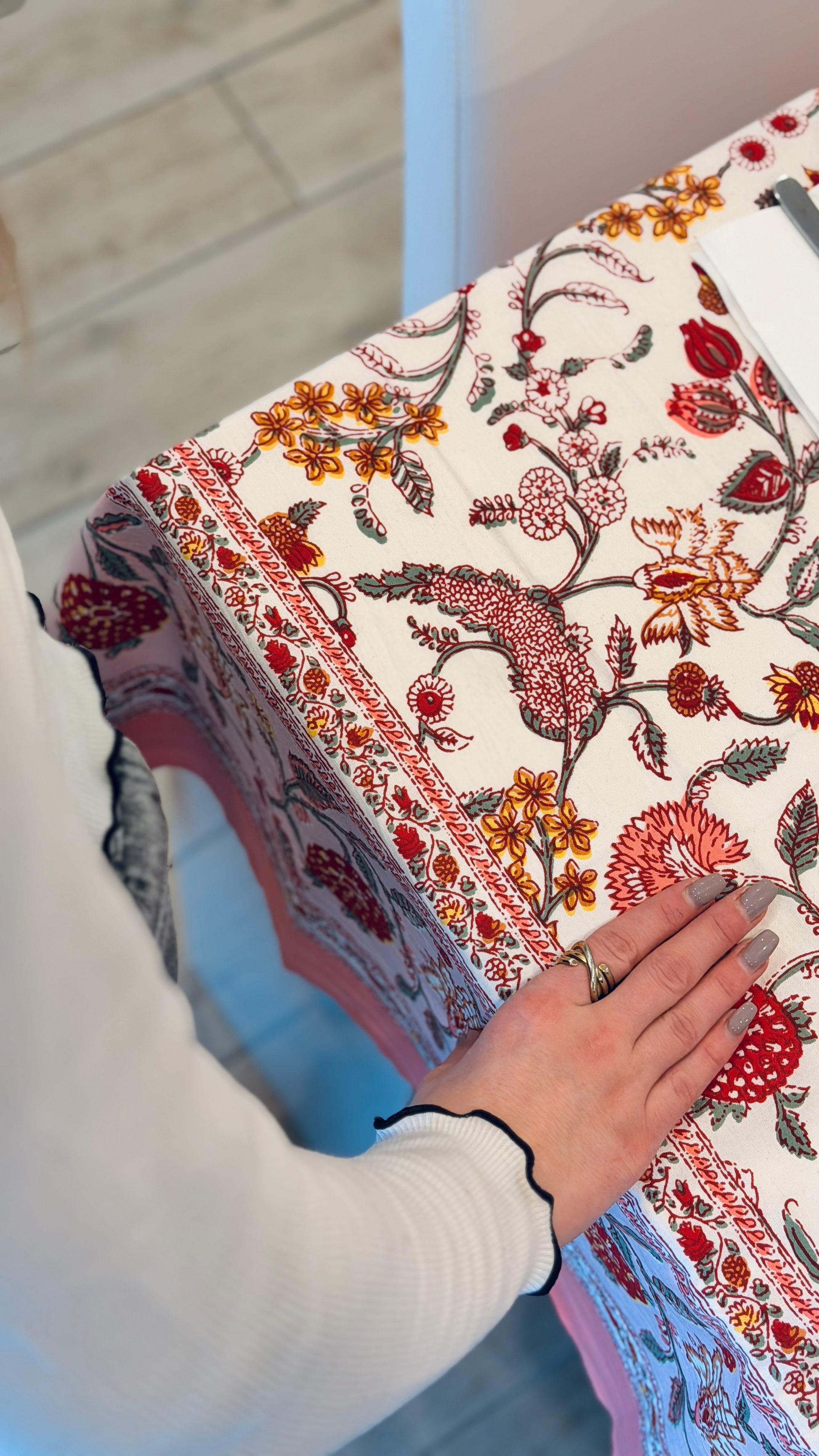Hand-printed peach pink and coral block print cotton tablecloth 150x220cm (60x87 inches): romantic floral ramage pattern with solid peach border.