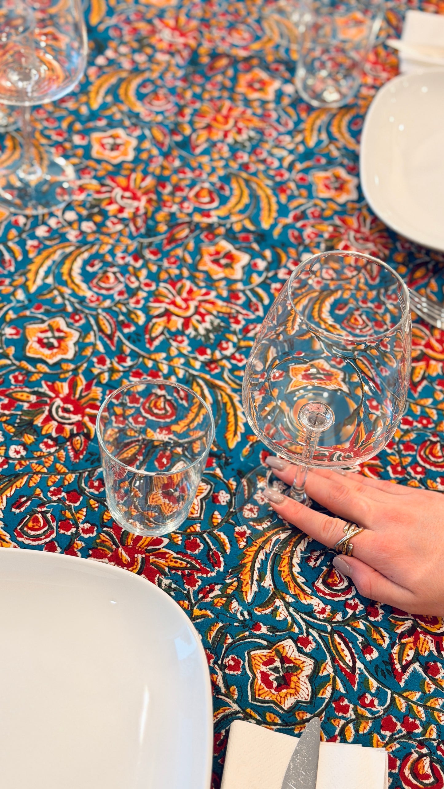 Hand-printed teal blue block print cotton tablecloth 150x220cm (60x87 inches): vibrant floral pattern with multi-layered decorative border and striped trim.