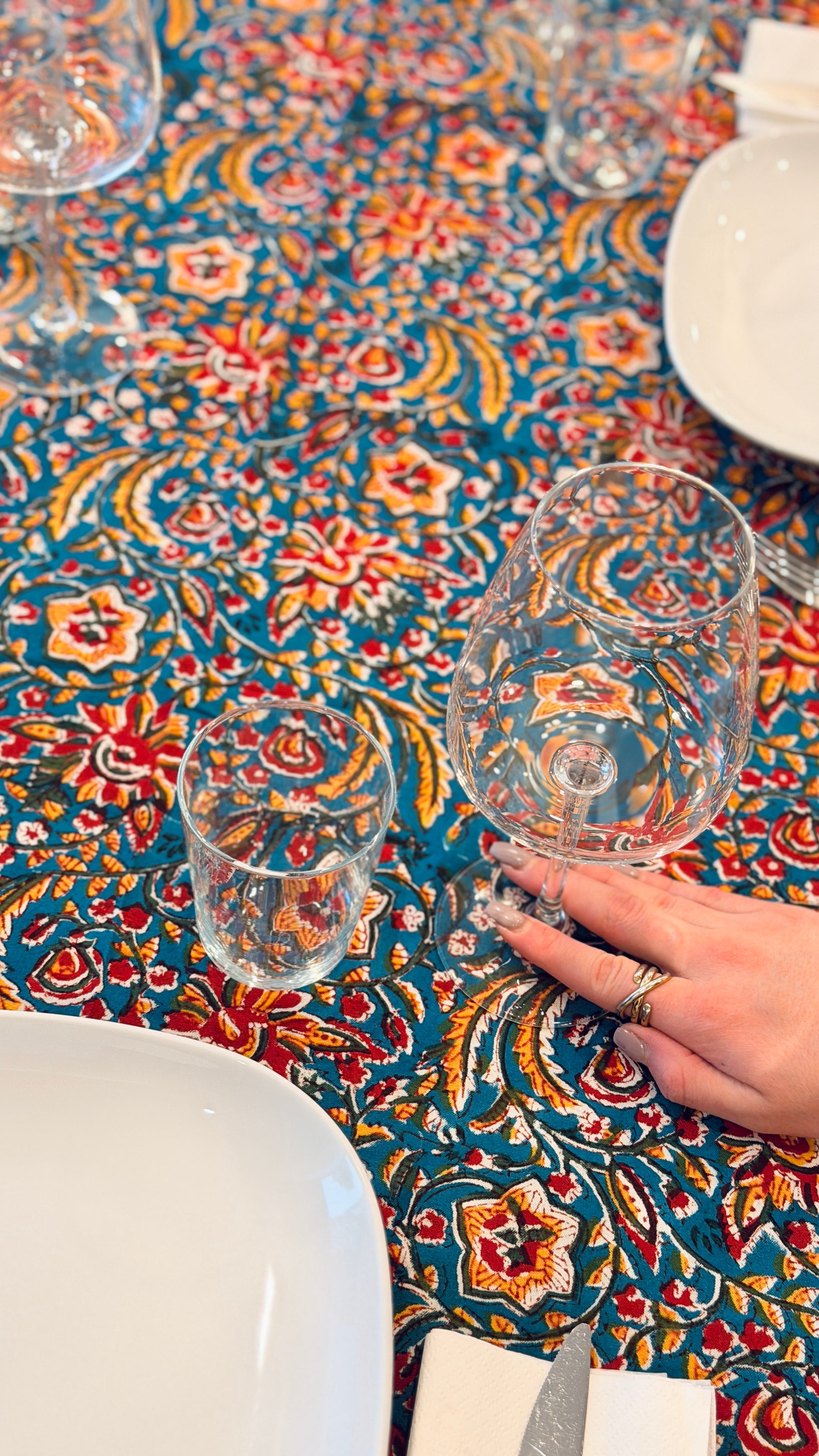 Hand-printed teal blue block print cotton tablecloth 150x220cm (60x87 inches): vibrant floral pattern with multi-layered decorative border and striped trim.