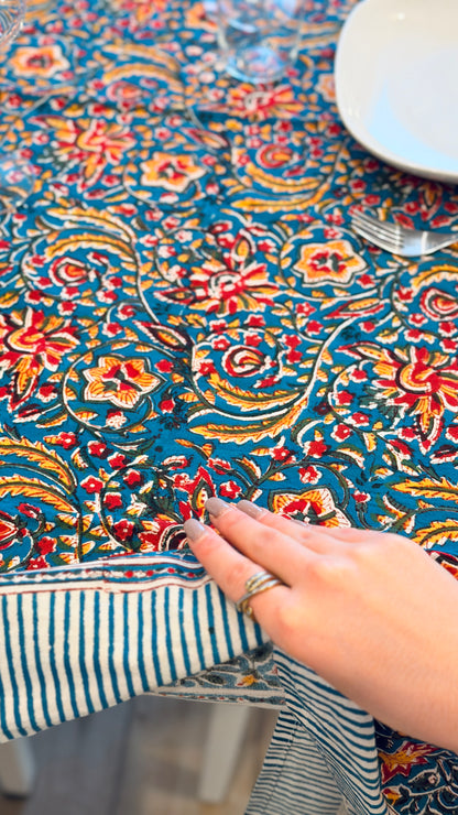 Hand-printed teal blue block print cotton tablecloth 150x220cm (60x87 inches): vibrant floral pattern with multi-layered decorative border and striped trim.