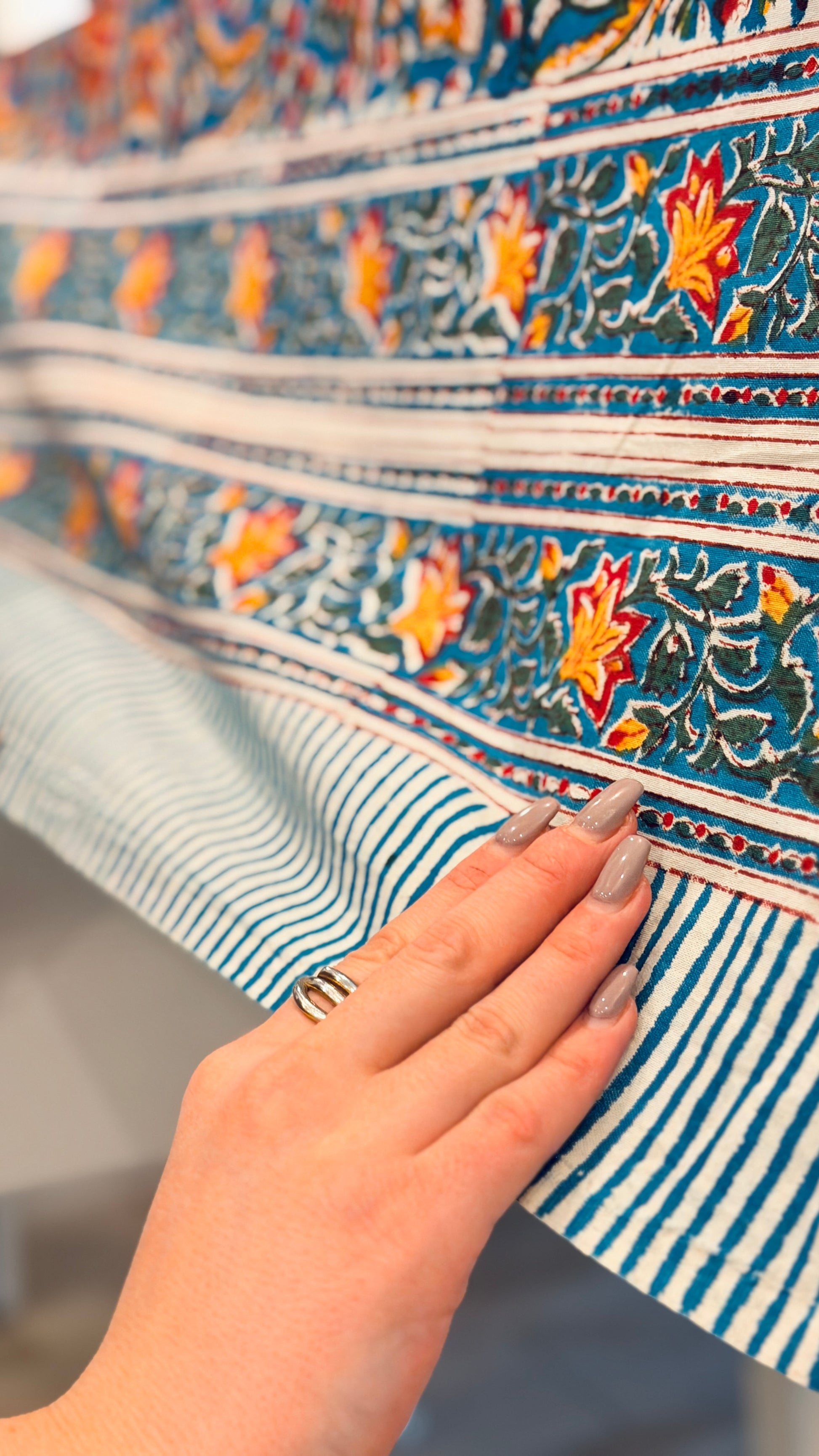 Hand-printed teal blue block print cotton tablecloth 150x220cm (60x87 inches): vibrant floral pattern with multi-layered decorative border and striped trim.