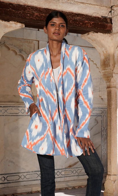 Quilted women's cotton kimono jacket with ikat design and pastel colors